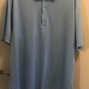 Men’s Greg Norman blue polo golf shirt size XL with fish embroidery